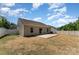 Cozy backyard featuring a concrete patio and surrounded by a privacy fence at 8316 Highgate Dr, Charlotte, NC 28215