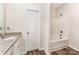 A well-appointed bathroom features a granite countertop and tiled shower at 8316 Highgate Dr, Charlotte, NC 28215