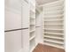 A neatly organized walk-in closet with ample shelving and hanging space at 8316 Highgate Dr, Charlotte, NC 28215