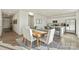 Bright dining area connected to the kitchen, featuring a table with seating for six at 833 Hallman Branch Ln, Lincolnton, NC 28092