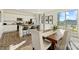 Eat-in kitchen with white cabinets, stainless steel appliances, and a large island with seating at 833 Hallman Branch Ln, Lincolnton, NC 28092