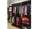 Spacious walk-in closet with ample storage and organization features at 10039 St Kitts Landing Ln, Charlotte, NC 28278