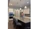 Gourmet kitchen features stainless steel appliances, a center island, and a breakfast nook with plenty of natural light at 10039 St Kitts Landing Ln, Charlotte, NC 28278