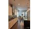 Gourmet kitchen featuring stainless steel appliances, granite countertops, and a breakfast nook with natural light at 10039 St Kitts Landing Ln, Charlotte, NC 28278