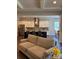 Comfortable living room open to a modern kitchen, great for entertaining at 10039 St Kitts Landing Ln, Charlotte, NC 28278