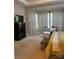 Sitting area in the spacious main bedroom with natural light at 10039 St Kitts Landing Ln, Charlotte, NC 28278