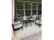 Charming outdoor patio area with comfortable seating, perfect for relaxing and enjoying the outdoors at 10039 St Kitts Landing Ln, Charlotte, NC 28278