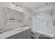 Stylish bathroom featuring double sinks, a glass shower, and modern fixtures at 112 Nautilus Ct, Troutman, NC 28166