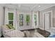 Bedroom lounge area with private deck and seating to enjoy lake views at 112 Nautilus Ct, Troutman, NC 28166