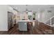 Spacious kitchen with a center island, stainless steel appliances, and an open layout at 112 Nautilus Ct, Troutman, NC 28166