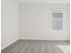 Bedroom features a window and neutral walls at 113 Obadiah Ct, Mooresville, NC 28115