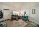 Bright living room showcasing laminate floors, stylish furniture and decorative wall accents at 11515 Retriever Way, Charlotte, NC 28269