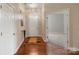 Welcoming foyer with hardwood floors and access to living spaces at 12013 Regent Ridge Ln, Charlotte, NC 28278