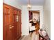 Inviting entryway with wood door, views to dining room, and wood laminate flooring at 1211 Starlight Dr, Shelby, NC 28152
