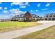 Impressive home with a circular drive and an attached three-car garage at 12613 Oak Grove Rd, Stanfield, NC 28163