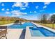 Stunning outdoor pool with beautiful landscaping and a sauna at 12613 Oak Grove Rd, Stanfield, NC 28163