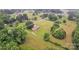 Expansive property featuring a home, lush green lawn, mature trees and an approximate boundary at 133 Jo Monni Loop, Statesville, NC 28625