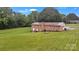 Aerial view of the brick home on a lush, green lot at 133 Jo Monni Loop, Statesville, NC 28625
