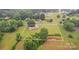 Aerial view of property showing the home, large grassy lawn, trees and approximate property lines at 133 Jo Monni Loop, Statesville, NC 28625