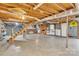 Unfinished basement with stairs and a fireplace at 133 Jo Monni Loop, Statesville, NC 28625