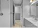 Neutral toned bathroom features a large single sink vanity at 133 Jo Monni Loop, Statesville, NC 28625