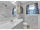 This updated bathroom features a shower/tub combo and a vanity with storage at 133 Jo Monni Loop, Statesville, NC 28625