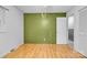 Cozy bedroom featuring light wood floors and a neutral-colored wall and closet at 133 Jo Monni Loop, Statesville, NC 28625
