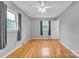 Comfortable bedroom featuring hardwood floors, ample light, and a ceiling fan at 133 Jo Monni Loop, Statesville, NC 28625