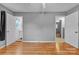 Bedroom featuring hardwood floors, neutral paint, closet, and an ensuite bathroom at 133 Jo Monni Loop, Statesville, NC 28625