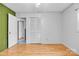 This light filled bedroom features hardwood floors and neutral walls at 133 Jo Monni Loop, Statesville, NC 28625