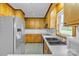 Functional kitchen with ample cabinet space and stainless steel appliances at 133 Jo Monni Loop, Statesville, NC 28625