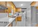 View of the kitchen, featuring stainless steel appliances and access to the living room at 133 Jo Monni Loop, Statesville, NC 28625