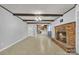 Spacious living room with brick fireplace, wood beams, and open layout at 133 Jo Monni Loop, Statesville, NC 28625