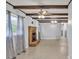 Inviting living room showcasing a brick fireplace, exposed beam ceilings, and natural light at 133 Jo Monni Loop, Statesville, NC 28625