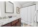 Bathroom featuring granite countertops, modern fixtures, and a clean, bright space at 13407 Hazelbrook Ln, Cornelius, NC 28031