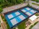 Aerial view of community pickleball courts and basketball courts with parking at 13407 Hazelbrook Ln, Cornelius, NC 28031