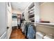 Spacious walk-in closet with custom shelving and ample storage for clothing and accessories at 13407 Hazelbrook Ln, Cornelius, NC 28031