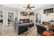 Comfortable living room with stylish furniture, wood-look floors, and ample natural light at 1406 W Walnut Ave, Gastonia, NC 28052