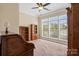This bedroom features neutral colored walls, carpet and large windows for ample sunlight at 1409 Tupelo Rd, Clover, SC 29710