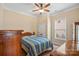 This bedroom features a ceiling fan, carpet, and a window with a view to the outside at 1409 Tupelo Rd, Clover, SC 29710