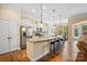 Bright kitchen with granite counters, stainless steel appliances, and a large center island with seating at 1409 Tupelo Rd, Clover, SC 29710
