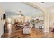 Open concept living room features hardwood floors, a fireplace, and seamless flow to the kitchen at 1409 Tupelo Rd, Clover, SC 29710