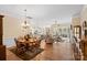 Expansive living space featuring hardwood floors, seamlessly connecting the dining room and living room for entertaining at 1409 Tupelo Rd, Clover, SC 29710