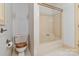 Cozy bathroom featuring a vintage toilet, a built in shower, and simple fixtures at 1513 Shelby Hwy, Cherryville, NC 28021