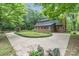 Two-story home featuring brick accents and surrounded by mature trees at 1513 Shelby Hwy, Cherryville, NC 28021