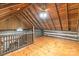 Cozy loft space with wood floors and log walls at 1513 Shelby Hwy, Cherryville, NC 28021