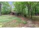 Antique outbuilding on property featuring wooden construction and rustic charm at 1513 Shelby Hwy, Cherryville, NC 28021