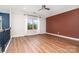 Bonus room with wood floors and a large window providing scenic outside views at 15637 Guthrie Dr, Huntersville, NC 28078