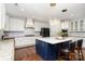 Modern kitchen featuring a blue island with white countertops and pendant lighting at 15637 Guthrie Dr, Huntersville, NC 28078