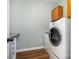 Laundry room featuring modern appliances and cabinets at 15637 Guthrie Dr, Huntersville, NC 28078